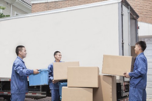 Local office removals team handling furniture in Dundee