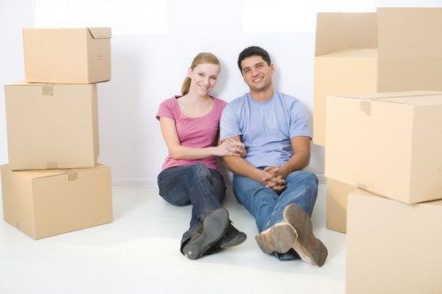 Local Dundee moving team loading furniture into a van